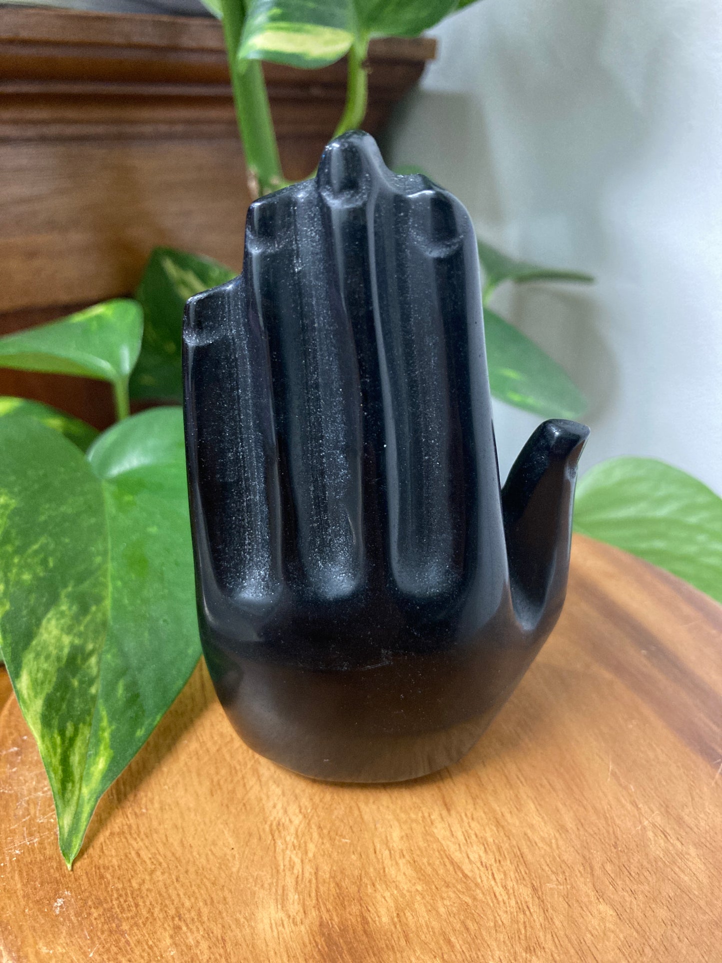 Black Obsidian Buddha within Hand
