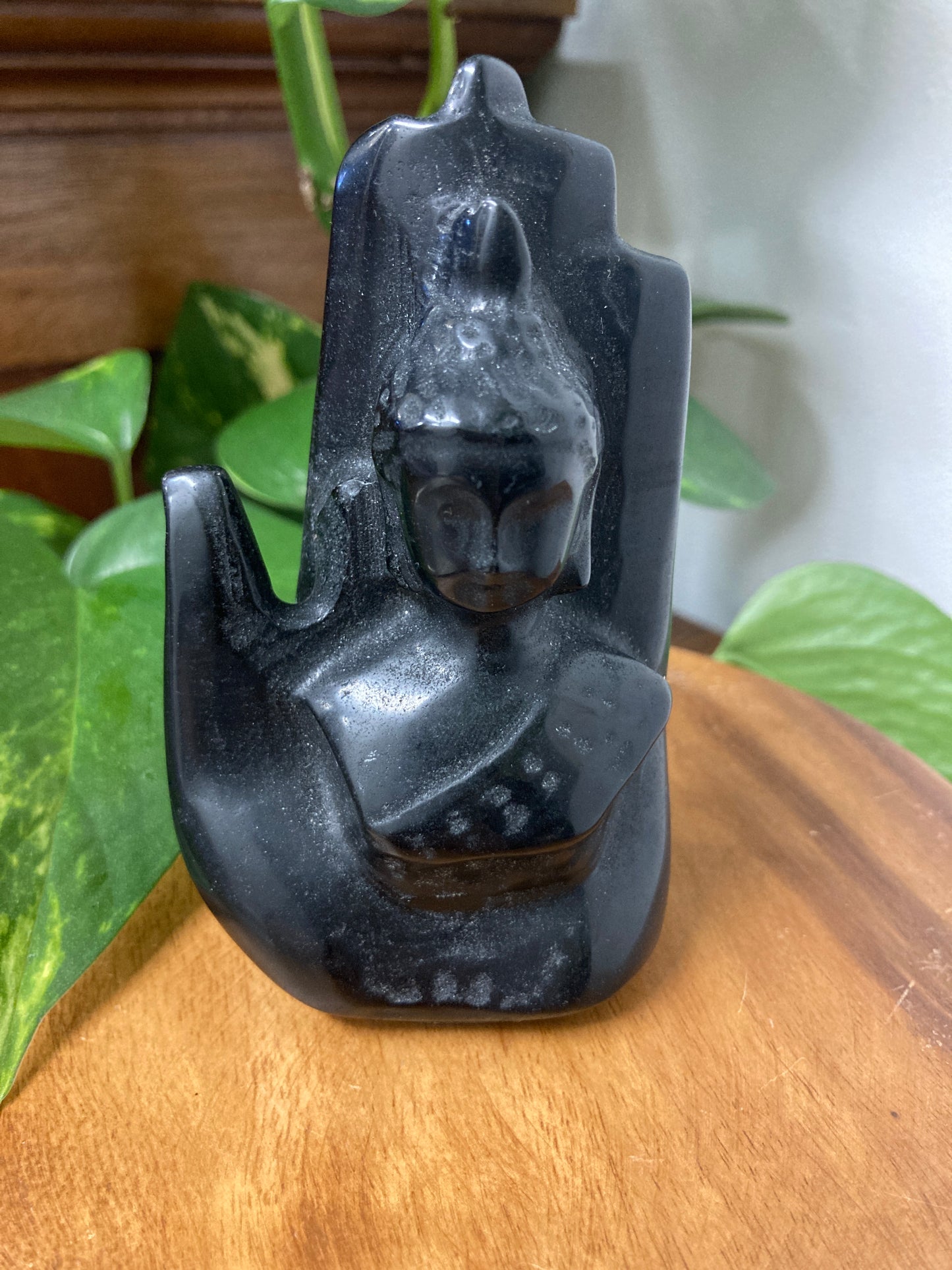 Black Obsidian Buddha within Hand